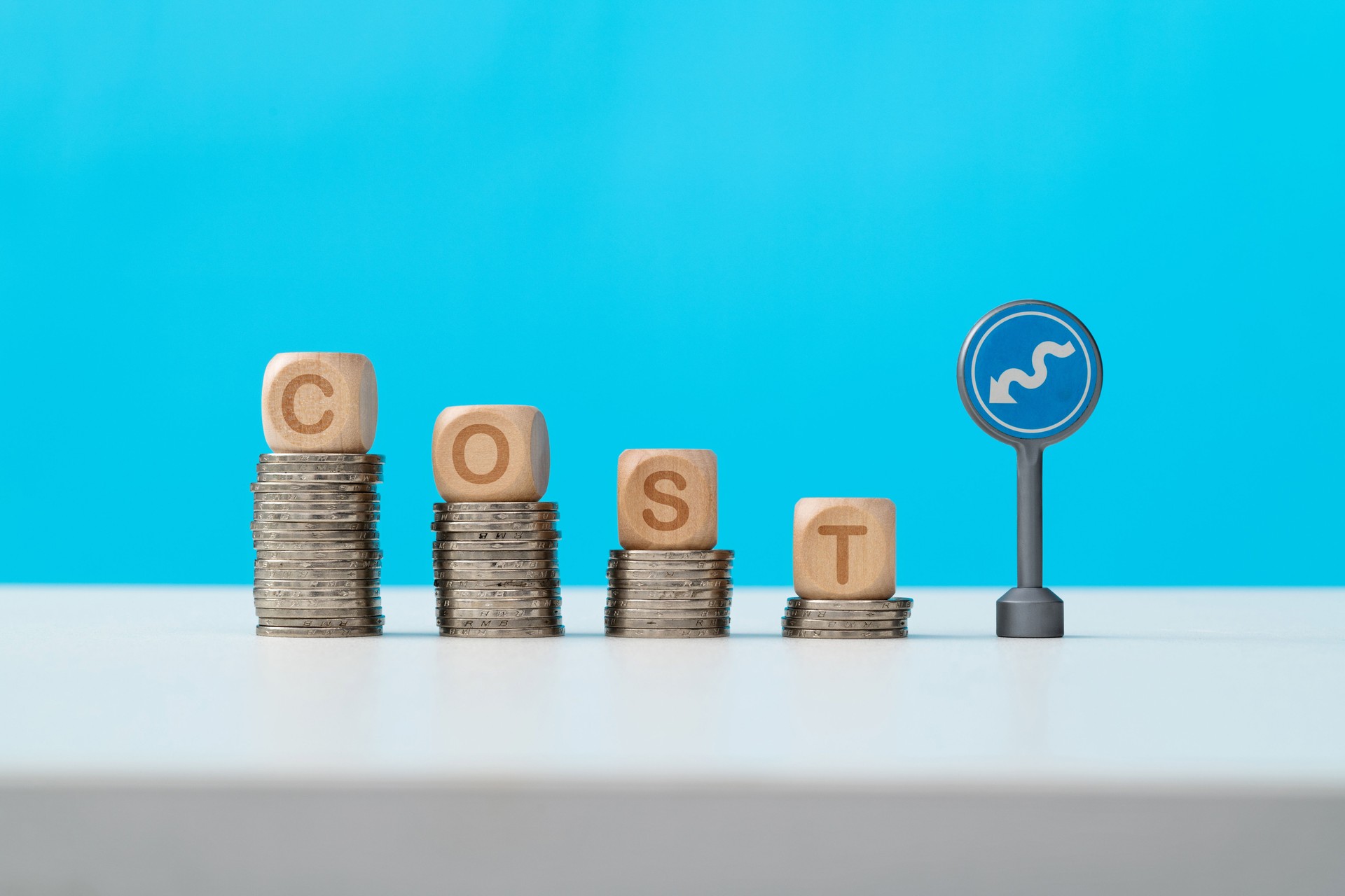 Word cost on stack of coins